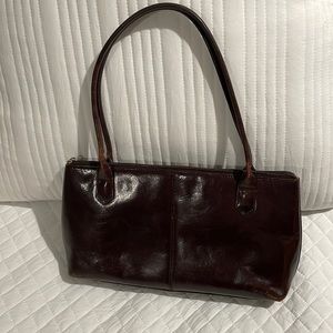 Hobo brown leather handbag, zipper. Gently used on the bottom corners, see pics